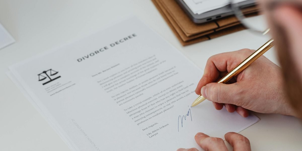 A professional carefully reviews legal documents, emphasizing the importance of understanding rental contracts.