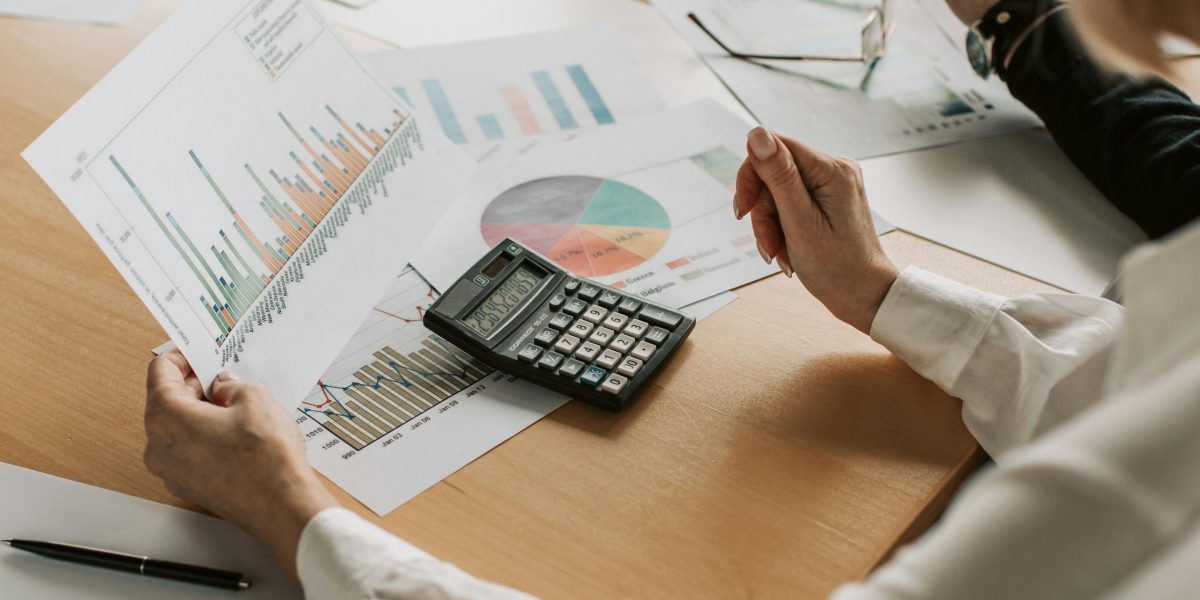 A person carefully considers options, reflecting the due diligence needed when engaging a real estate agent in Dubai.