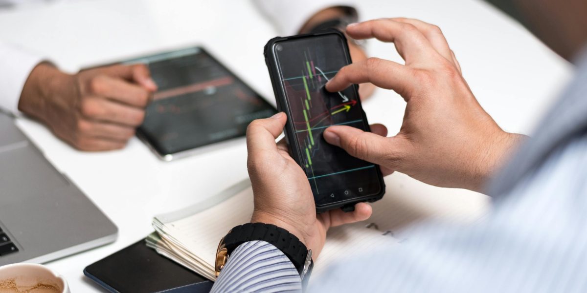 Professionals collaborate to analyze complex market data and identify key trends.