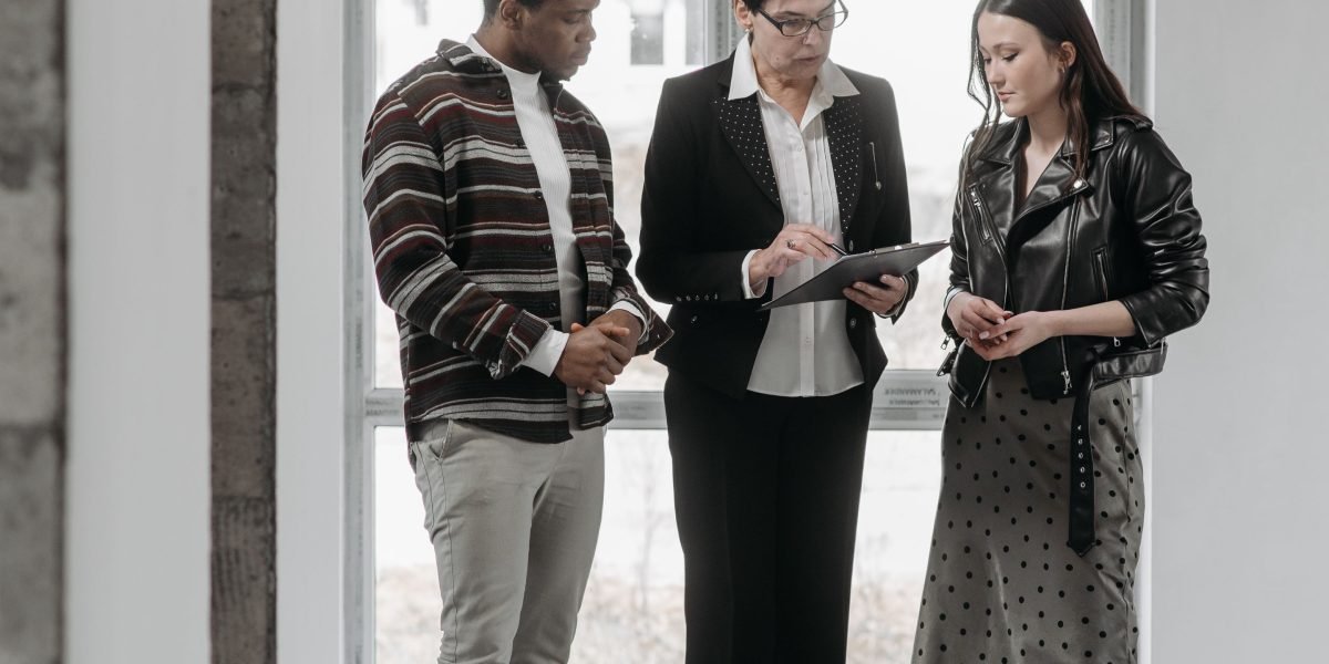 A real estate agent engages in a detailed conversation with a client, understanding their unique lifestyle and investment goals.