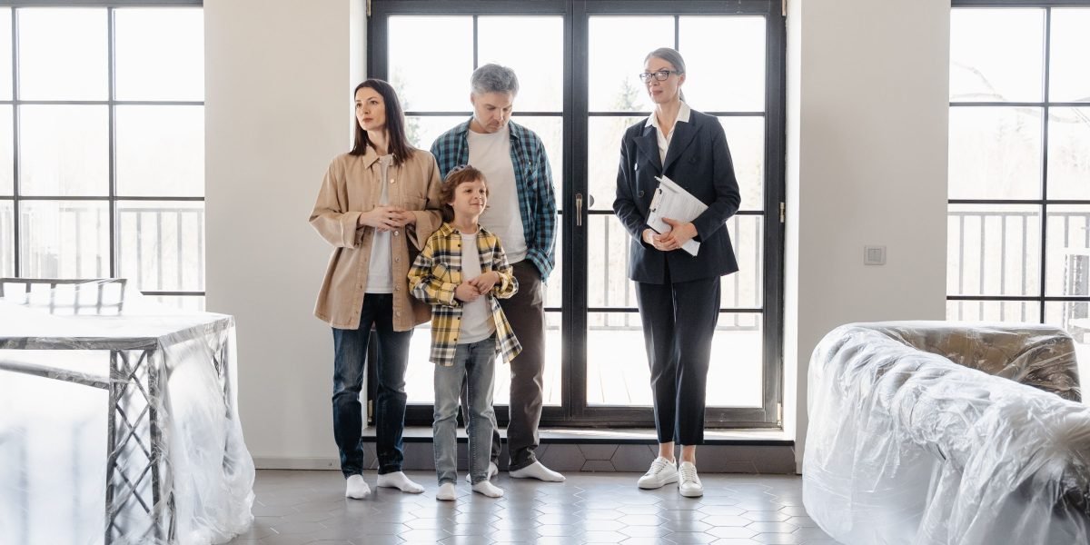 A family enjoying their spacious and well-designed apartment, reflecting Arenco's focus on quality living spaces.