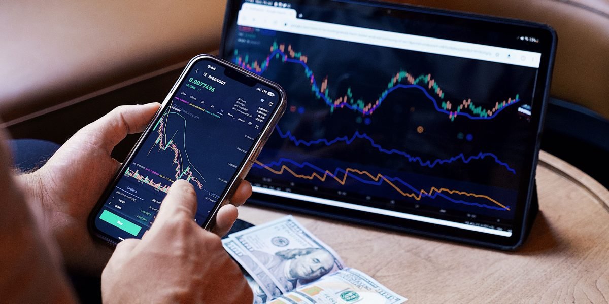 An investor thoughtfully reviewing options, symbolizing the careful consideration needed in complex markets.