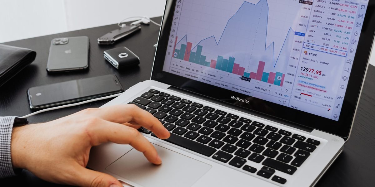 An individual diligently researches off-plan property investments, emphasizing due diligence and careful planning.