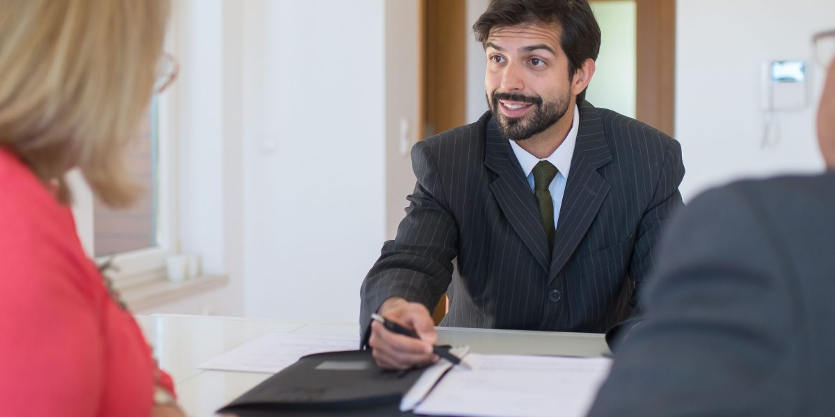 A real estate expert provides personalized advice to a client, guiding them through investment strategies for unique properties.